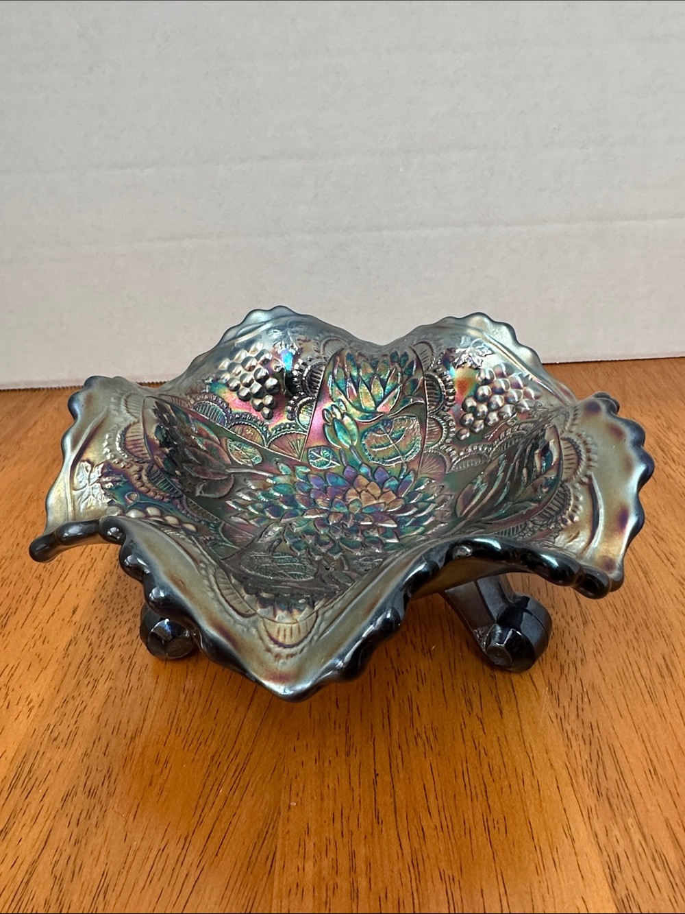Fenton antique carnival glass bowl in the grape and lotus pattern. Footed.